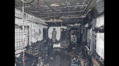 92-year-old woman, son die in apartment blaze