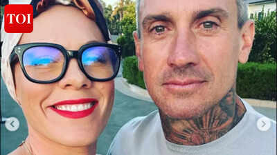 Pink RUBBISHES reports of split from Carey Hart after 20 years of marriage - WATCH