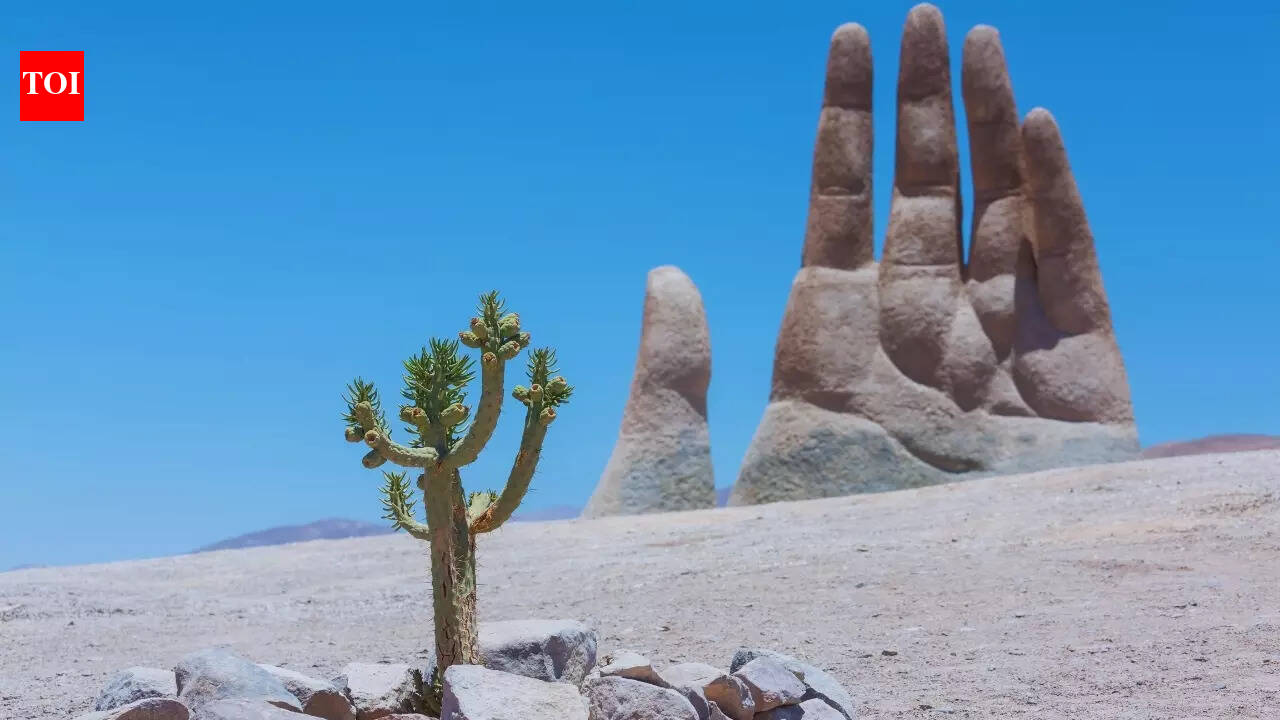 Why is there a giant hand in the middle of a desert in Chile?