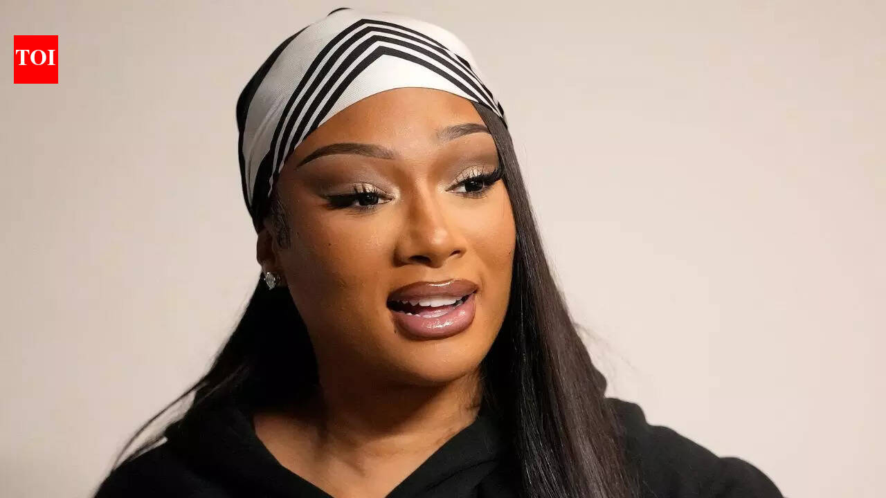 Megan Thee Stallion stuns in gold and black look, Klay Thompson reacts