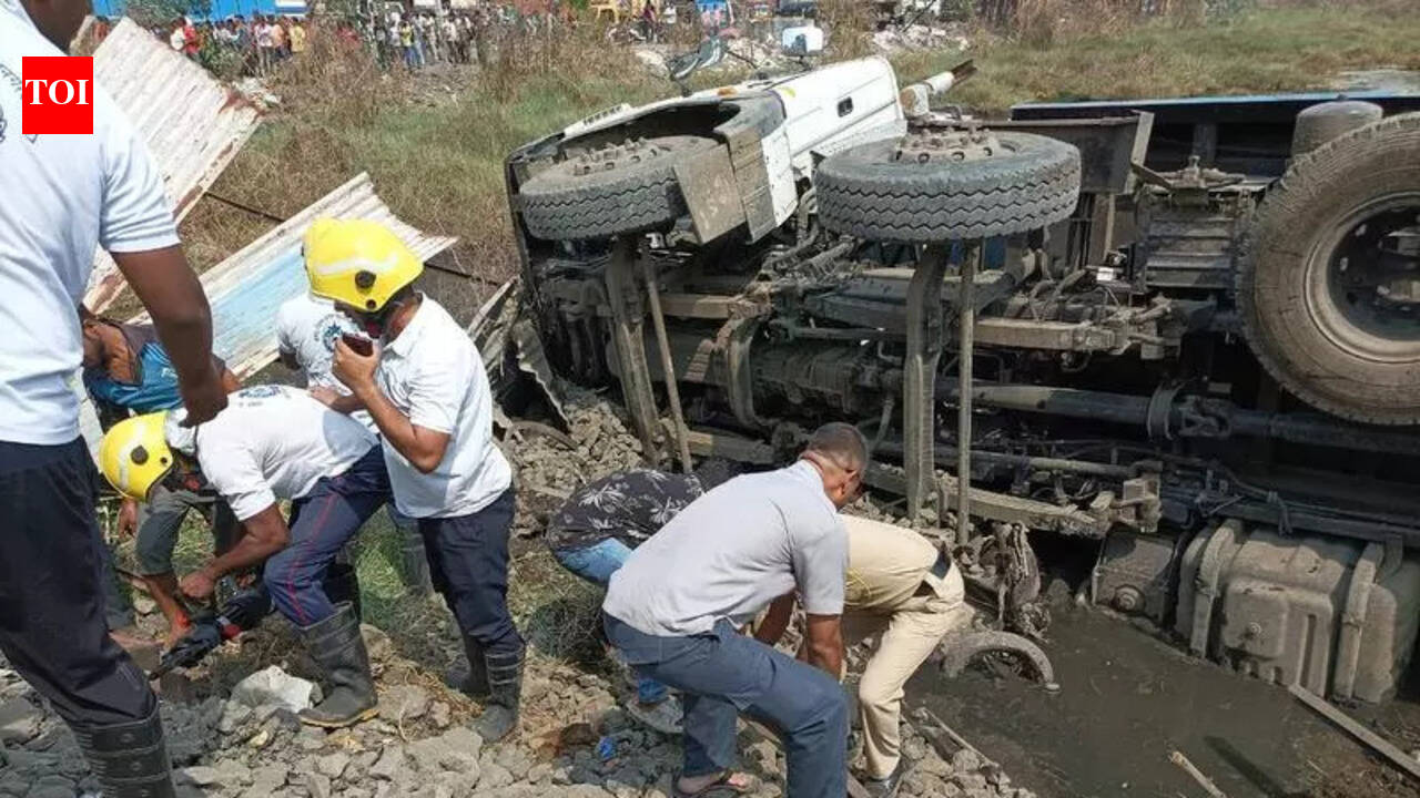Tipper truck overturns, damages three cars; several injured