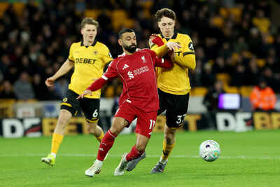 Wolves shock Liverpool with stoppage-time strike