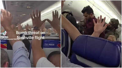  Video shows passengers raising hands as man is dragged off Southwest flight after security scare