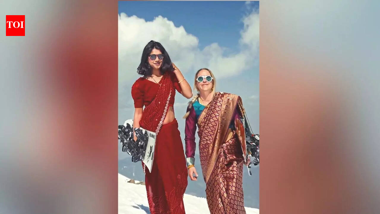 Snowboarders slay it in saris in Gulmarg