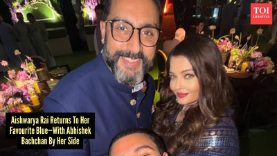 Aishwarya Rai Bachchan’s blue anarkali steals the show while Abhishek Bachchan matches her in royal style