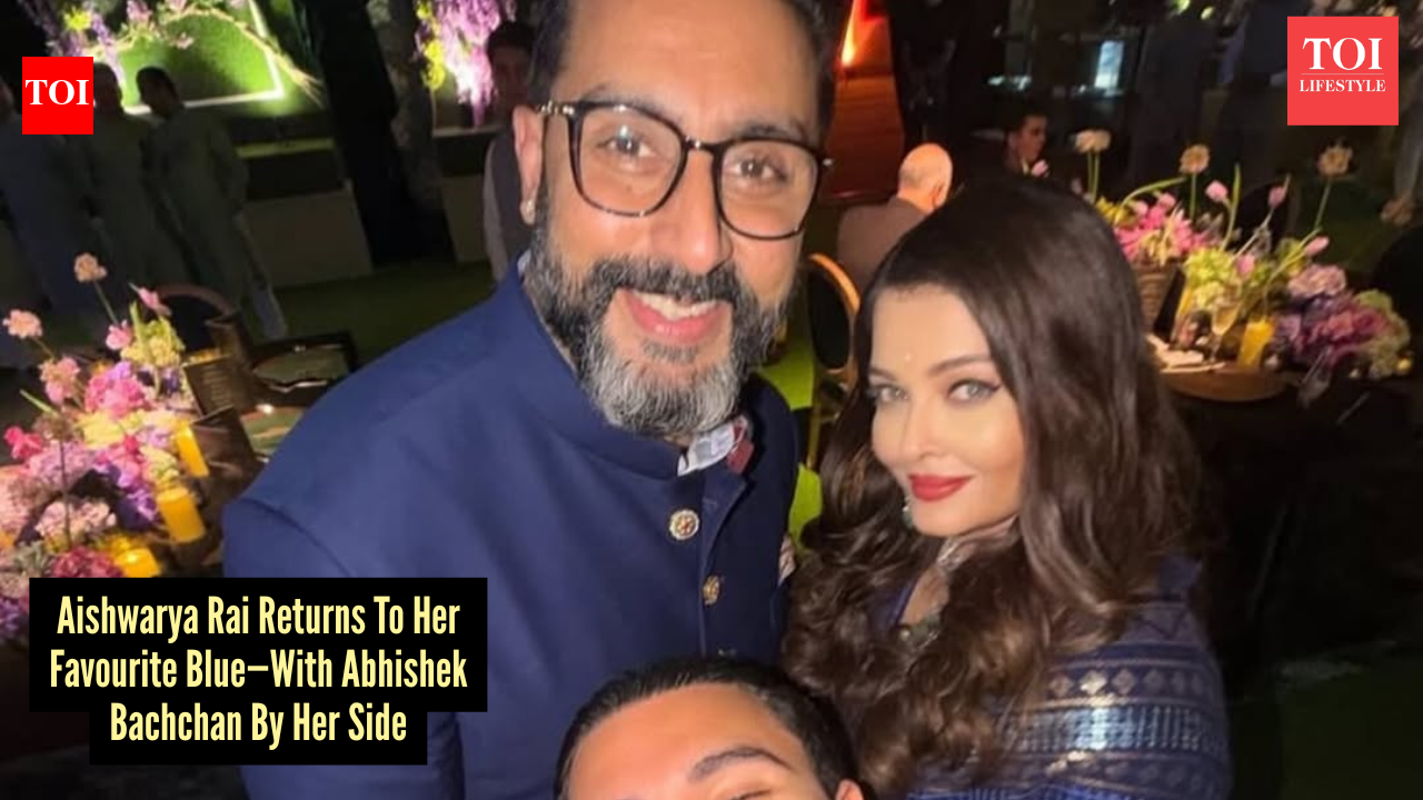 Aishwarya Rai Bachchan’s blue anarkali steals the show while Abhishek Bachchan matches her in royal style