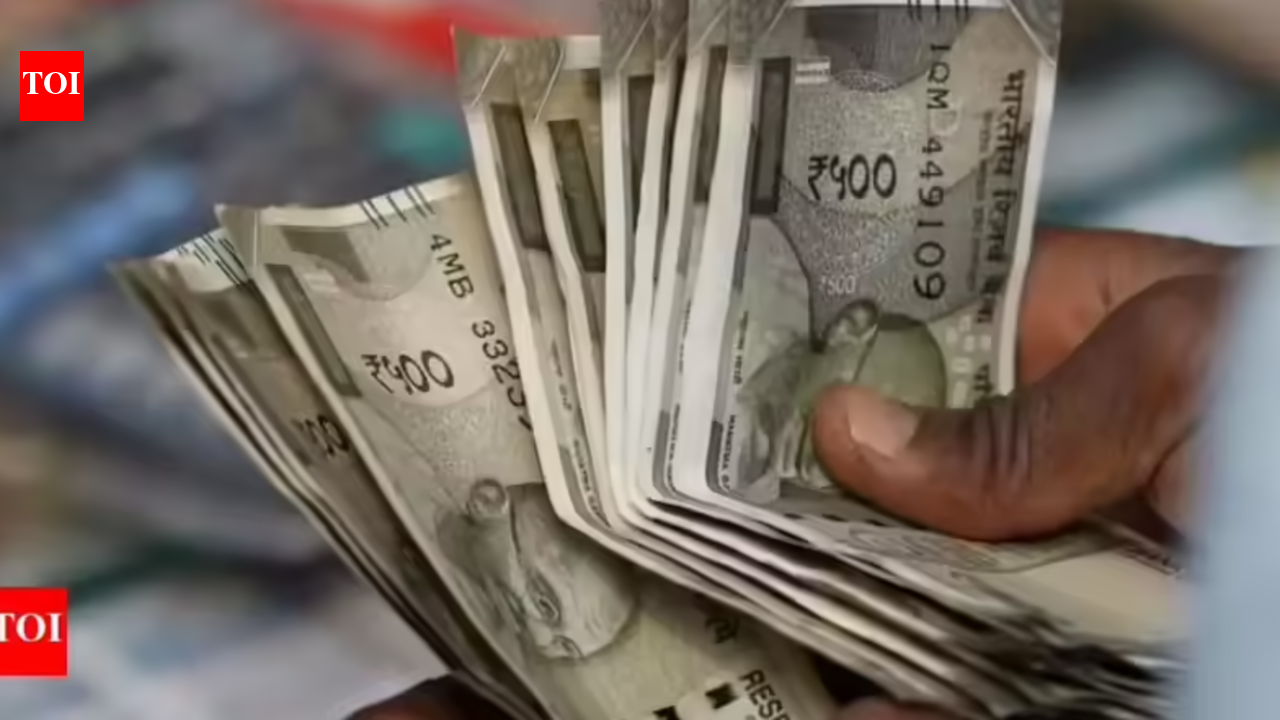 Rupee gains as oil slips but volatility remains high