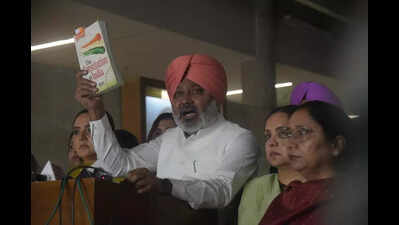 Khaira gagged till apology; AAP MLAs storm well, raise slogans; Bajwa leads Congress counter