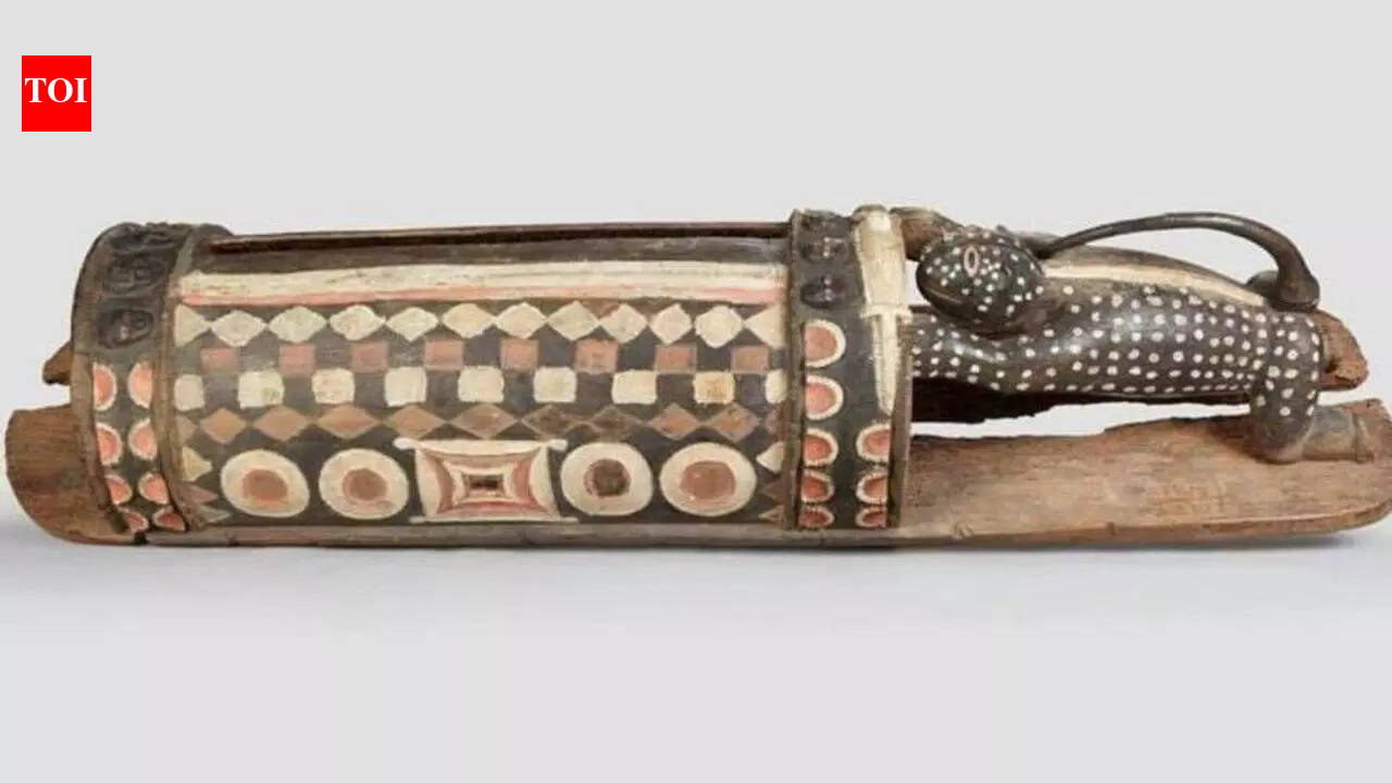 France returns African talking drum: The sacred instrument that once 'spoke' to entire villages and warned of danger