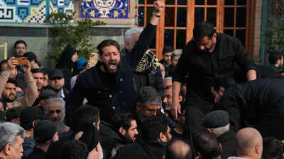 Iran's leaders defy Trump with bellicose talk & public parades