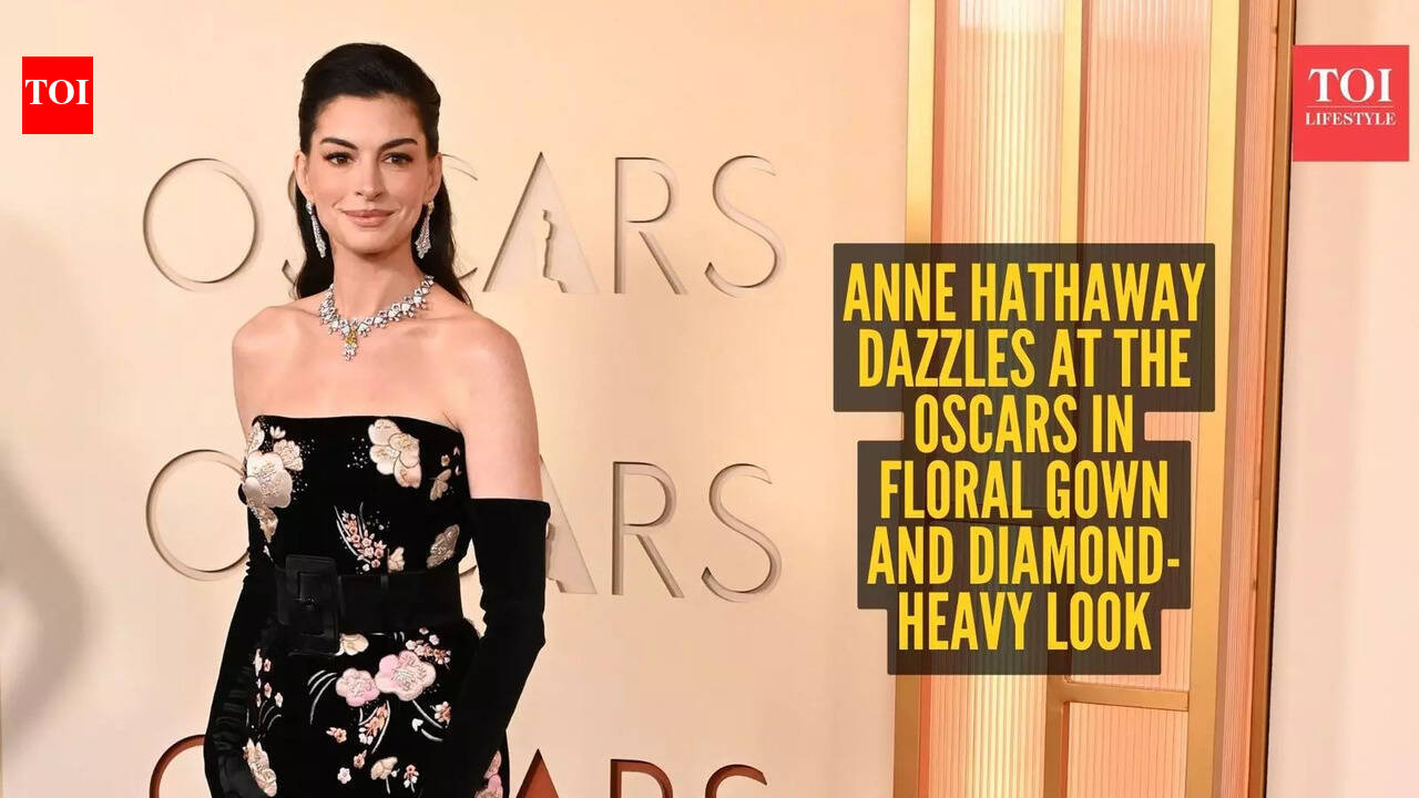 Anne Hathaway owns the Oscars 2026 red carpet in a stunning floral mermaid gown