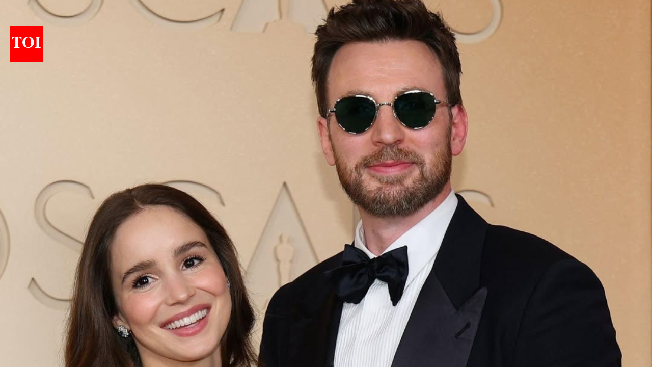 Chris Evans and Alba Baptista charm fans with a rare red carpet appearance at the 2026 Oscars after welcoming their daughter