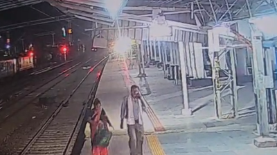 Woman pushes 8-year-old daughter in front of train at railway station; child critical, incident caught on CCTV