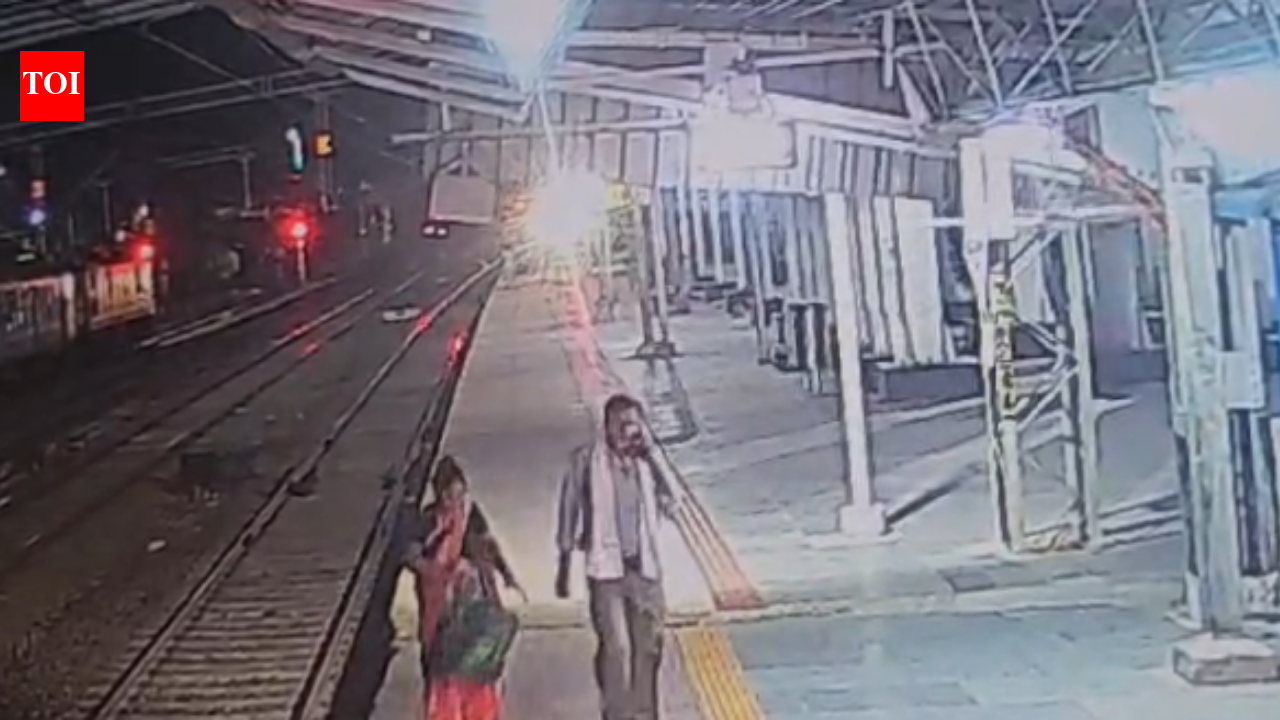 Woman pushes 8-year-old daughter in front of train at railway station; child critical, incident caught on CCTV