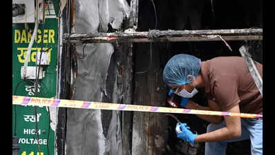 Excessive heat starts second blaze in charred building