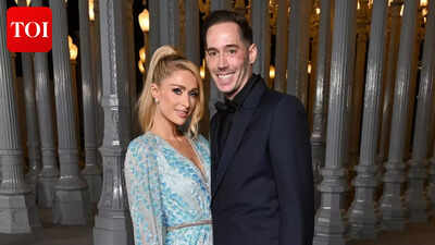 Paris Hilton’s husband, Carter Reum, says ‘she loves me to death,’  squashing the ongoing rumors about their marriage