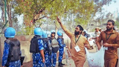 Delhi's Uttam Nagar shares Eid wishes & sevaiyan across barricades; residents shower rose petals on security personnel