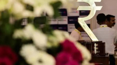 Rupee falls 35 paise to close at record low of 93.98 against dollar