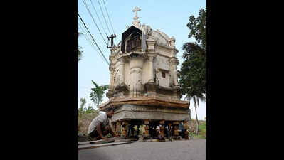 Faith on iron wheels: Parishioners shift 200-yr-old shrine from demolition path