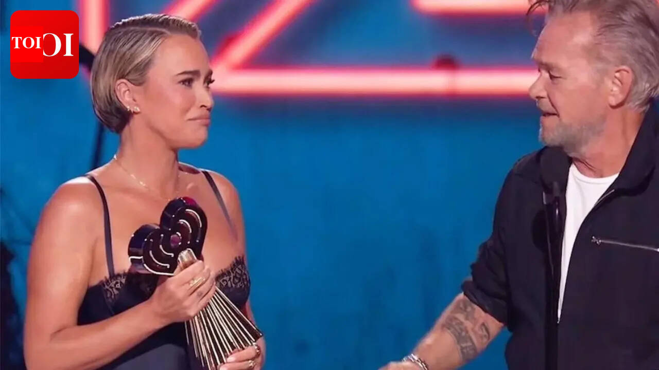 Teddi Mellencamp fights back tears presenting dad John Mellencamp with iHeartRadio Icon Award: 'He pretty much saved my Llfe'