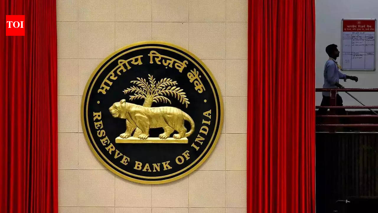 RBI’s forced dollar unwind to keep rupee from sliding, bruise banks | India News – The Times of India