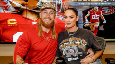 George Kittle’s wife Claire raises temperatures online with daring black blazer and figure-hugging top fashion post