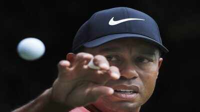 mexico-city-tiger-woods-eyes-a-ball-to-catch-that-was-tossed-at-him-by-his-cadd.jpg