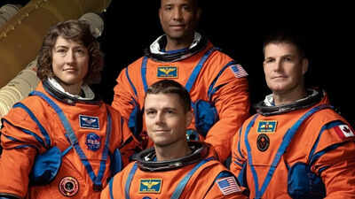 Why NASA’s Artemis II astronauts are wearing bright orange spacesuits on this historic mission