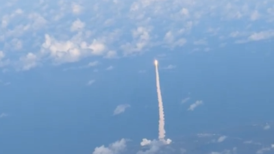  Artemis II launch captured from inside commercial jet over Kennedy Space Center