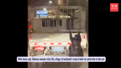 Wife turns spy: Chinese woman risks life, clings to husband's truck trailer to catch him in the act
