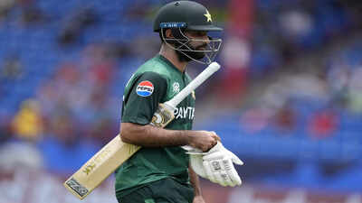 pakistan39s-fakhar-zaman-leaves-the-field-after-losing-his-wicket-during-the-icc-.jpg
