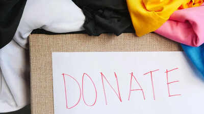 Can donating food or clothes help remove hurdles and negativity?