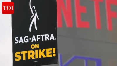 Screenwriters union, Hollywood studios reach four-year tentative agreement to avert strikes, boosts pay