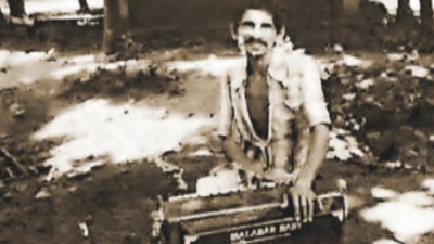  An unsung ‘influencer’ with a harmonium & coins at his feet