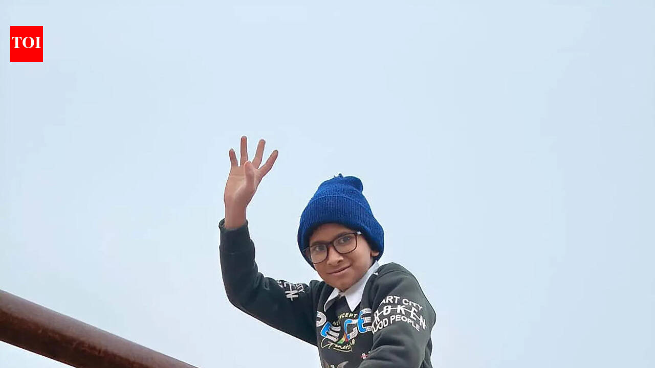 Eight-year-old crushed by reversing school van metres from his home