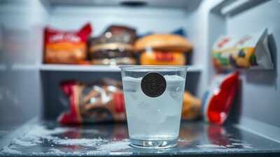 Why do some people put a coin in the freezer before travelling?