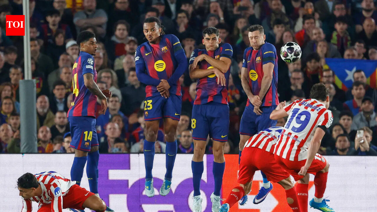 Atletico Madrid beat 10-man Barcelona 2-0 to take control of quarter-final
