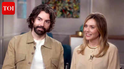 Elizabeth Olsen sparks pregnancy speculation during Los Angeles outing with husband Robbie Arnett - PICS