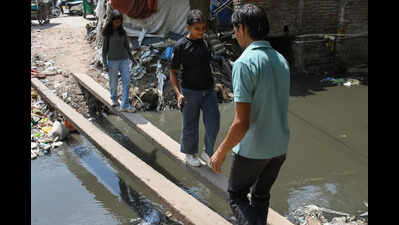 Covers off, dredging on to clear legacy silt that waterlogged central Delhi