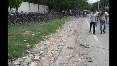Udyog Vihar’s missing footpaths: Where walkers merge with traffic daily