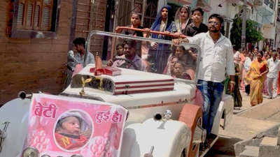 UP family celebrates birth of 2nd daughter with vintage car