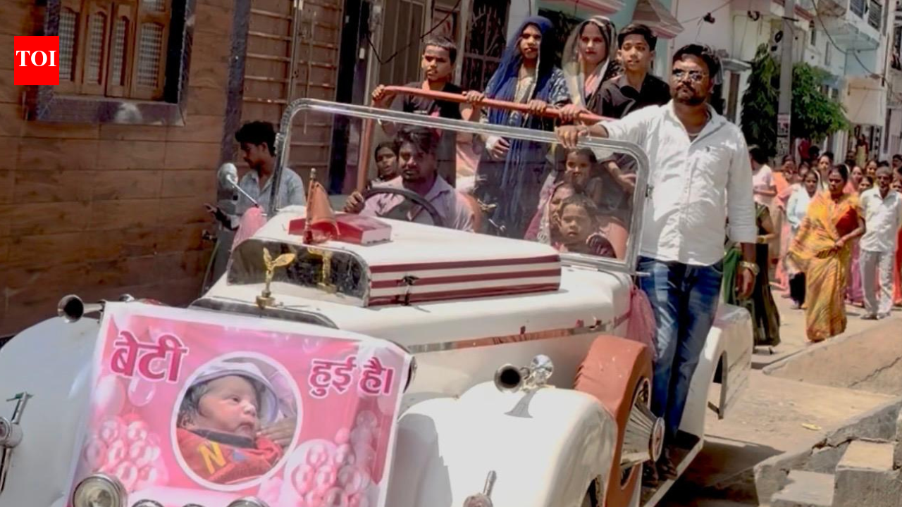 UP family celebrates birth of 2nd daughter with vintage car