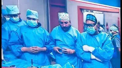 Laser sys to remove cardiac blockages