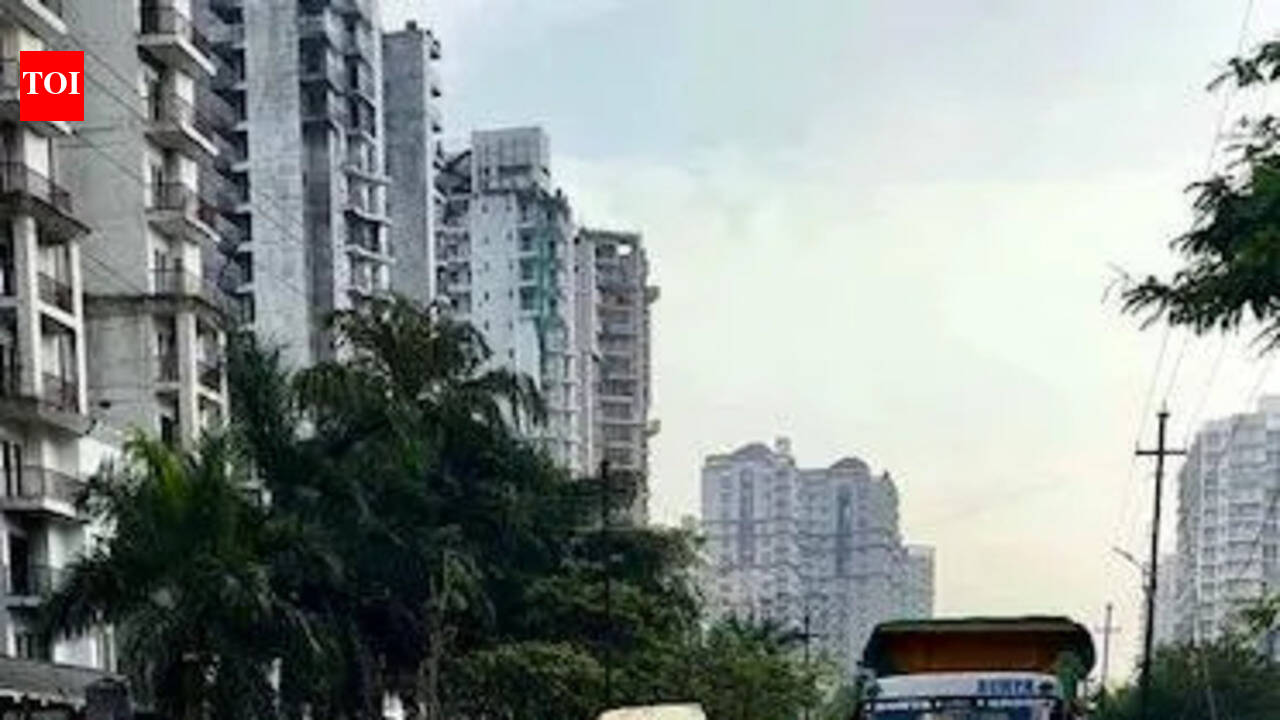 Road leading to school, condos littered with craters, flood-prone
