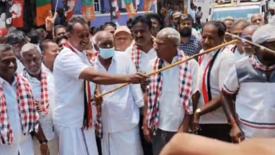 Velumani performs silambam during campaign in Coimbatore