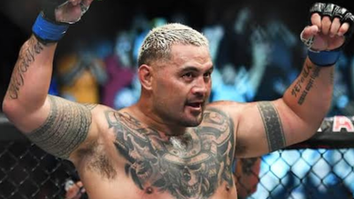Former UFC fighter Mark Hunt arrested after alleged message to woman leads to stalking charge and strict bail conditions