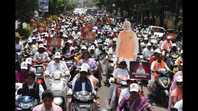 BJP Yuva morcha holds scooty rally in support of women’s quota bill