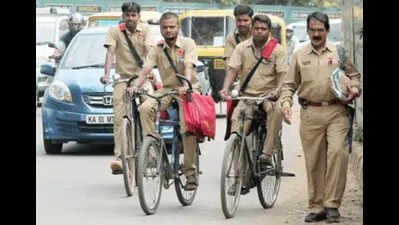 Postmen shift gears as bicycles reach end of the road