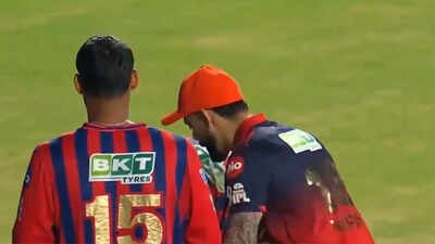 Touching moment: Virat Kohli stunned as LSG youngster tries to touch RCB batter's feet - Watch