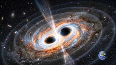 Two giant black holes are set to collide in the next 100 years, and Earth could feel the shockwaves
